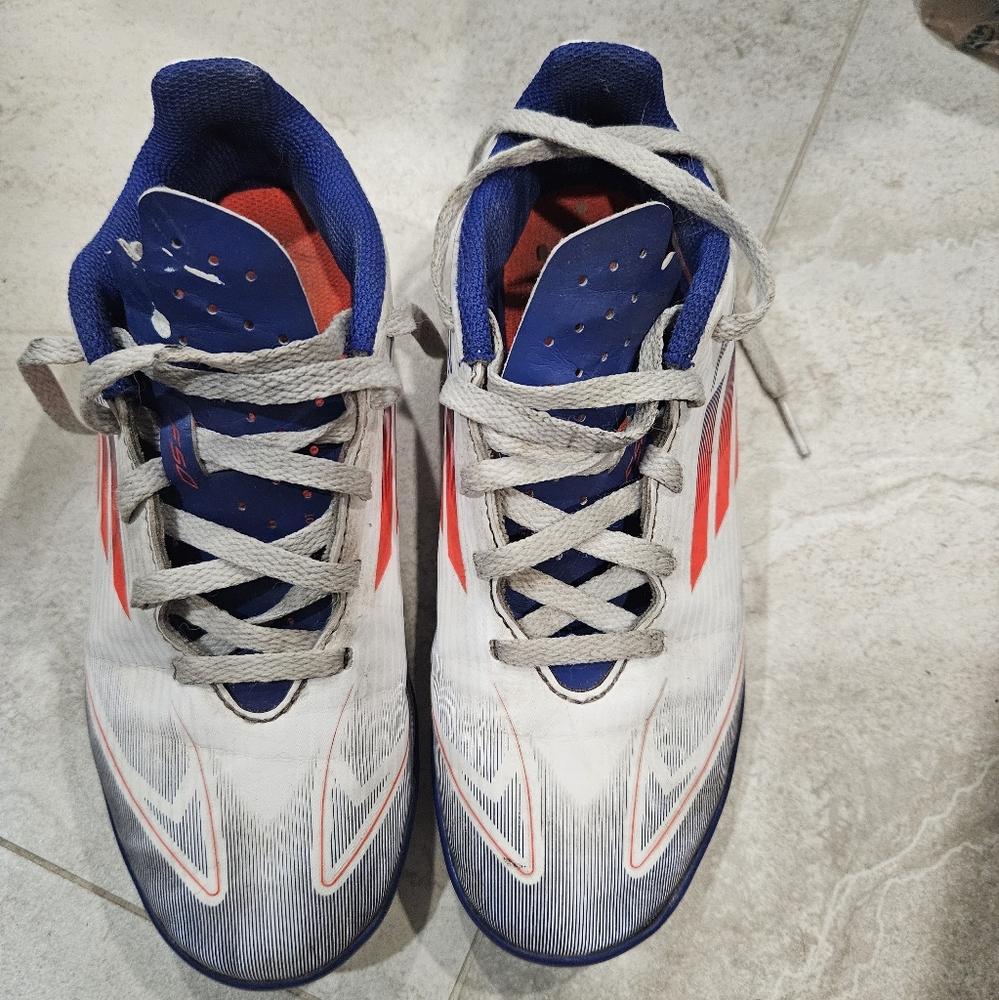Adidas White and Blue Turf Cleats with Red Highlights.
